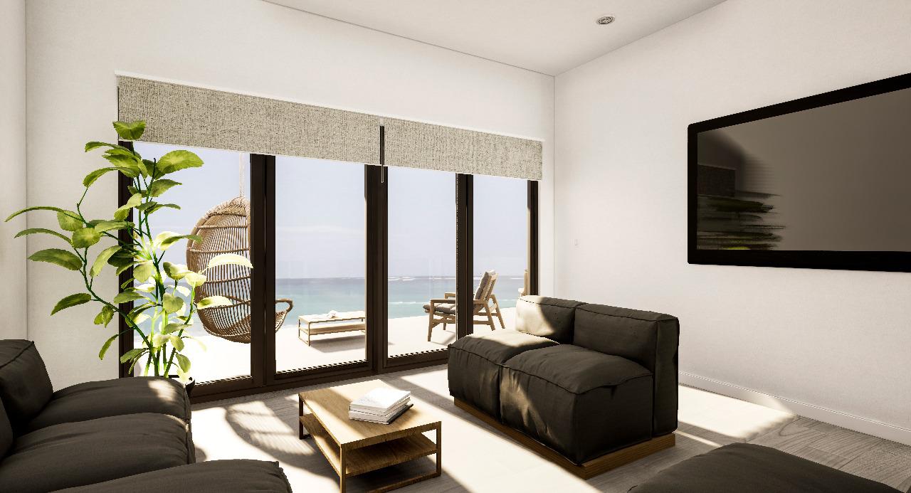 Ocean-view living room opening to a beachfront terrace