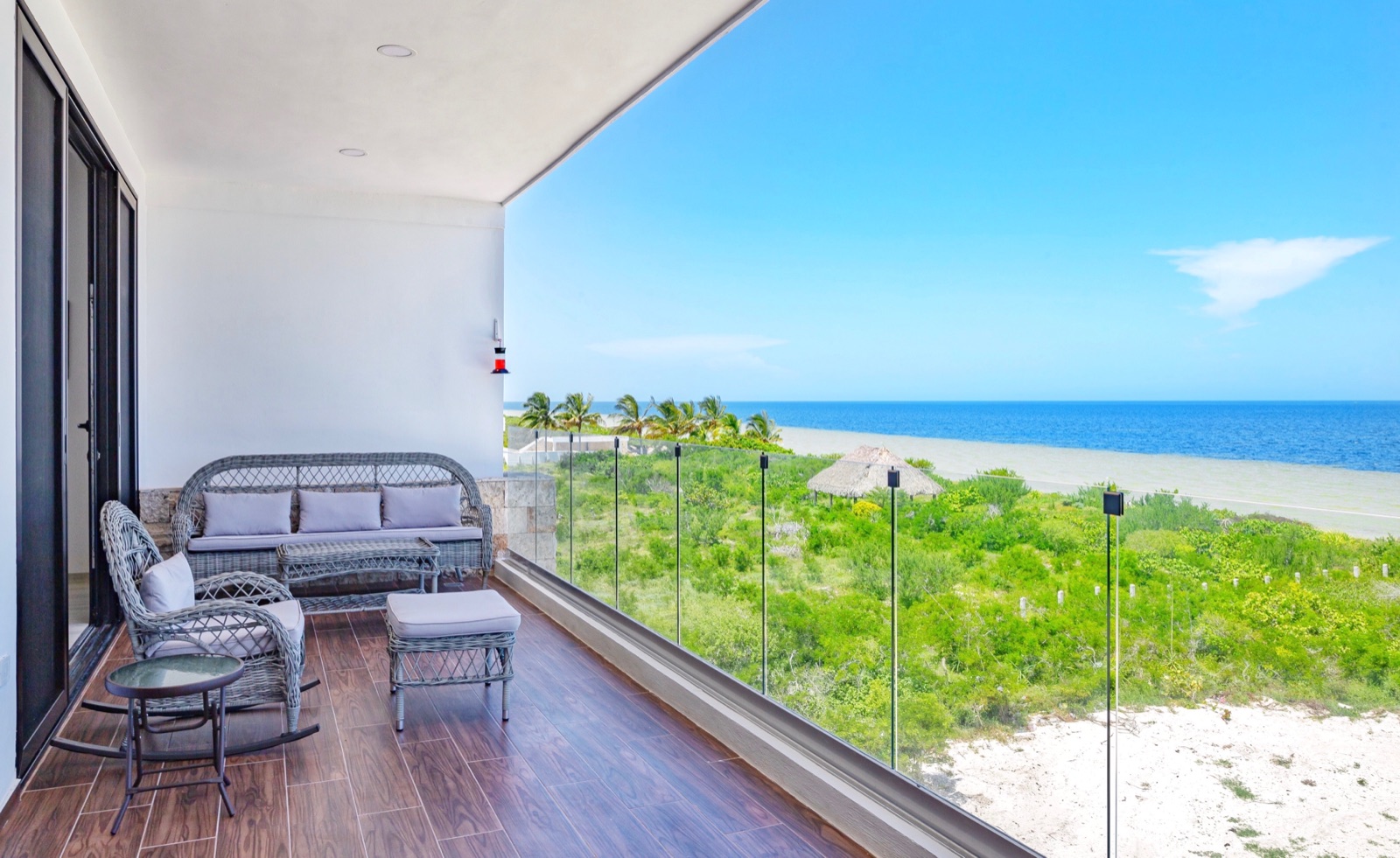 The real ocean and beach view from a Vista Esmeralda terrace