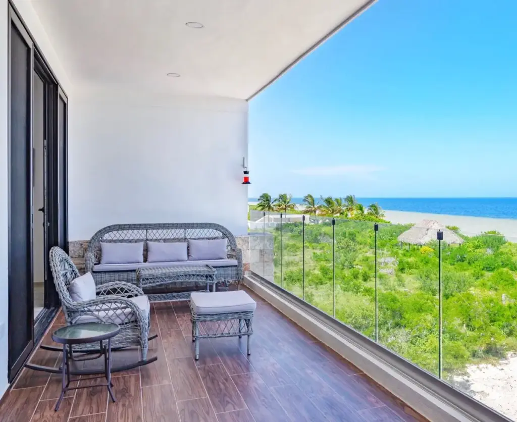 View from the balcony from a beachfront condo in Yucatan Mexico looking to the ocean.
